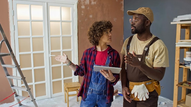 discussing renovation plans home workshop 274679 58490